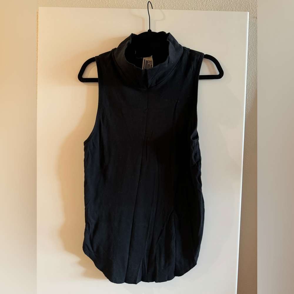 Free People tank with loose turtleneck/cowl. Really cute piece
